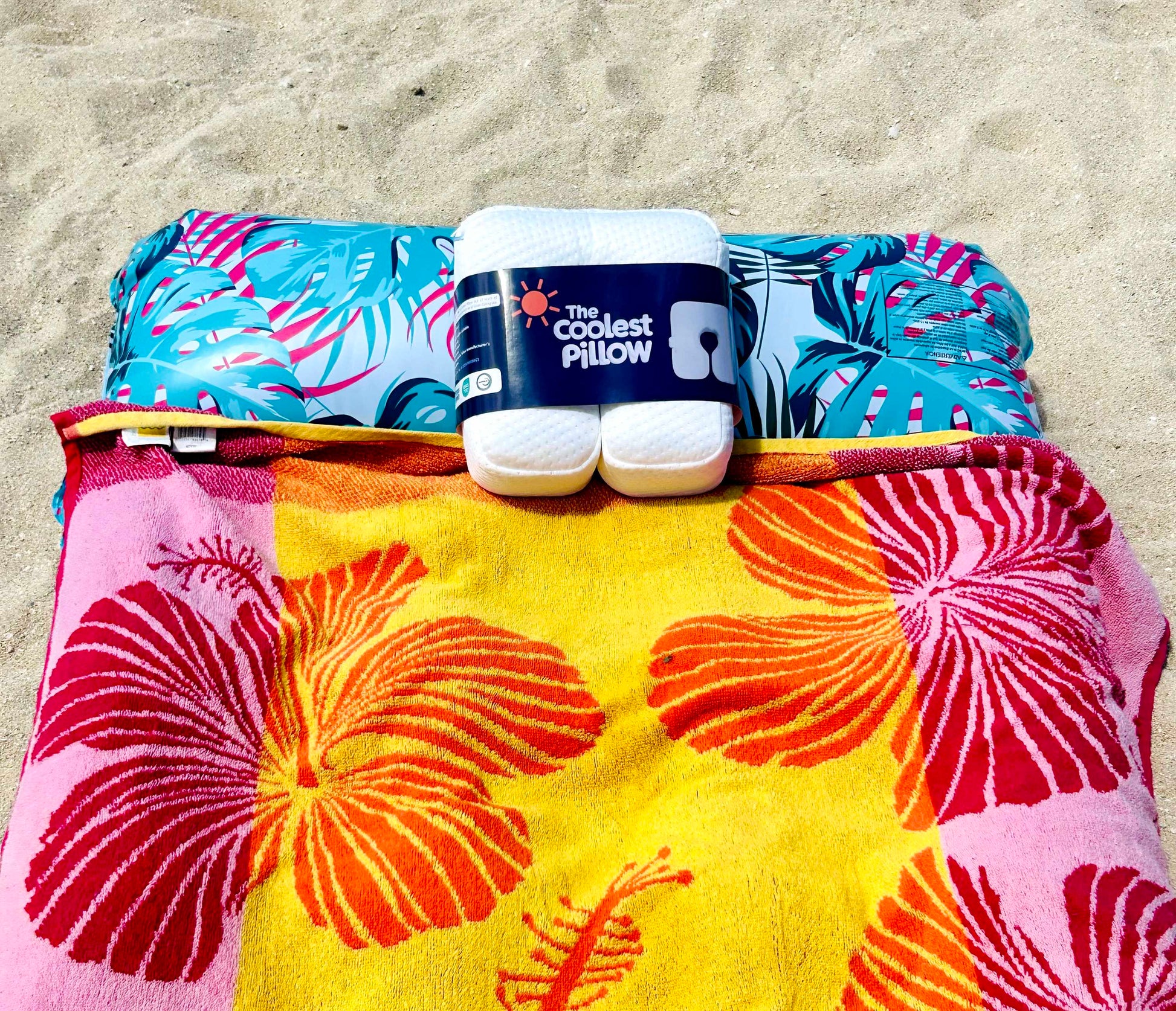 Cooling beach pillow with white quilted fabric for refreshing beach naps and tanning with The Coolest Pillow by Bunzzup